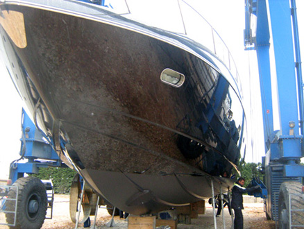 Dressing boat in a balloon (Nautimar Zadar). Yacht painting and boat care in Croatia.